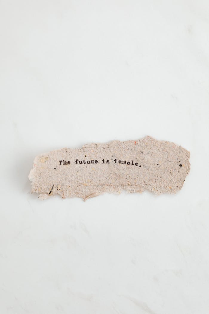 founder-img Torn paper with text The future is female. on a white background.